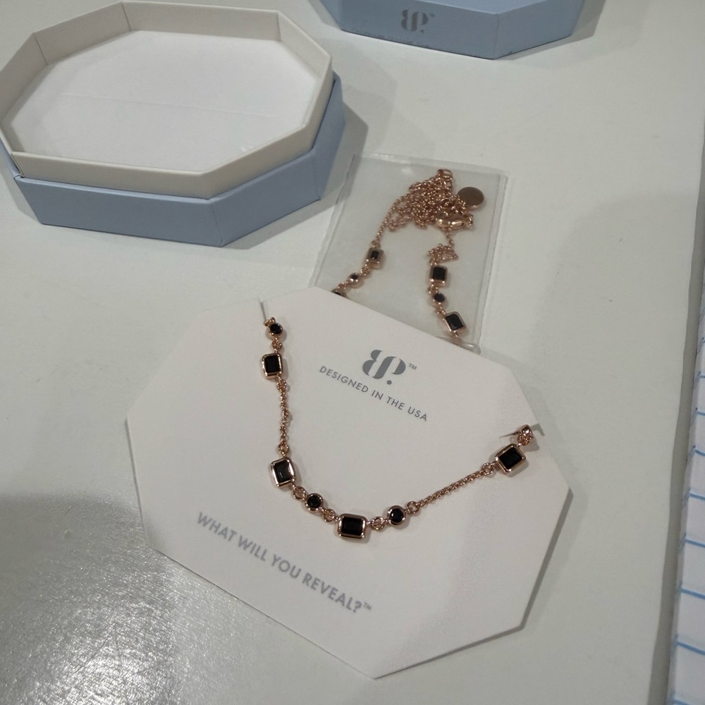 Chic Rose Gold Necklace with Black Details